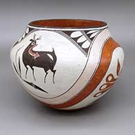 Polychrome jar with a four-panel traditional Acoma design featuring deer-with-heart-line, parrot, flower, rainbow, and geometric elements
 by Rose Chino Garcia of Acoma