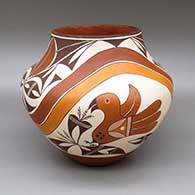 Polychrome jar with a painted traditional Acoma design featuring parrot, flower, rainbow, and geometric elements
 by Marie Juanico of Acoma