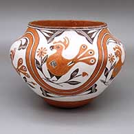 Polychrome jar with a six-panel traditional Acoma design featuring parrot, flower, rainbow, and geometric elements
 by Jesse Louis of Acoma