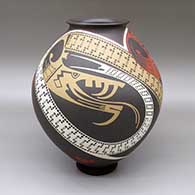 Large polychrome jar with a flared opening and an abstracted serpent geometric design
 by Juan Quezada Sr of Mata Ortiz and Casas Grandes