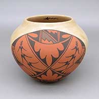 Polychrome jar with a cornstalk, feather, and geometric design on front and a lightning bolt detail inside the rim
 by Juanita Fragua of Jemez