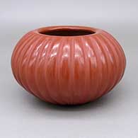 Red melon jar with thirty-two carved ribs
 by Angela Baca of Santa Clara