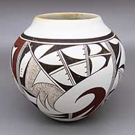 Polychrome jar with a four-panel geometric design
 by Joy Navasie aka 2nd Frogwoman of Hopi