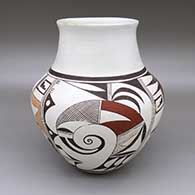 Polychrome jar with a four panel geometric design
 by Joy Navasie aka 2nd Frogwoman of Hopi