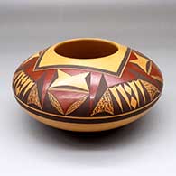 Polychrome jar with a four-panel geometric design above the shoulder
 by Steve Lucas of Hopi
