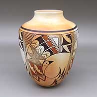 Polychrome jar with a fire clouds and a painted geometric design; includes an Honorable Mention ribbon from the 1983 Deer Dancer Annual Pottery Show
 by Fawn Navasie of Hopi