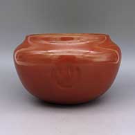 Polished red jar with two bear paw imprints, click or tap to see a larger version