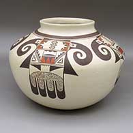 Polychrome jar with a slightly flared opening and a four-panel geometric design
 by Daisy Hooee of Hopi