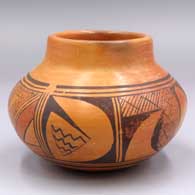 Polychrome jar with a raised rim and a 4-panel geometric design around the shoulder
 by Nancy Lewis of Hopi