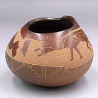 Brown jar with an organic opening and a sgraffito dog, whale, mask and geometric design
 by Dolly Naranjo Neikrug of Santa Clara