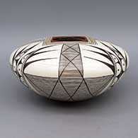 Polychrome jar with fine line and geometric design
 by Sylvia Naha of Hopi