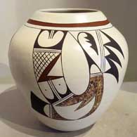 Polychrome jar with bird element and geometric design
 by Dawn Navasie of Hopi