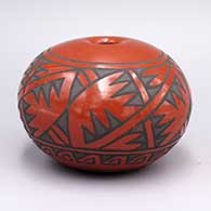 Red polished jar with matte black geometric design
 by Minnie Vigil of Santa Clara