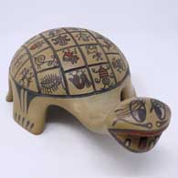 Polychrome turtle figure with insect, reptile and animal designs
 by Margaret and Luther Gutierrez of Santa Clara