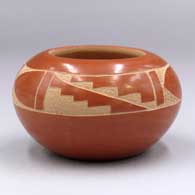Red bowl with a 4-panel sgraffito geometric design
 by Elston Yepa of Jemez