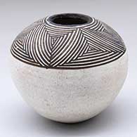 Black-on-white jar with a snowflake fine line design above the shoulder
 by Mary Lewis Acoma of Acoma