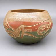 Polychrome jar with a sgraffito avanyu design and micaceous slip details
 by Jennifer Tse Pe of San Ildefonso