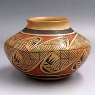 Polychrome jar with a raised, recurved lip and an 8-panel migration pattern design
 by Fannie Nampeyo of Hopi
