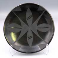 Black-on-black plate with a geometric design
 by Maria Martinez of San Ildefonso