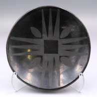 Black-on-black plate with a geometric design
 by Santana Martinez of San Ildefonso