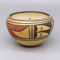 Small polychrome bowl with fire clouds and a six-panel geometric design
 by Sadie Adams of Hopi