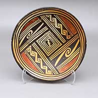 Polychrome shallow bowl with fire clouds and a painted geometric design
 by Grace Chapella of Hopi