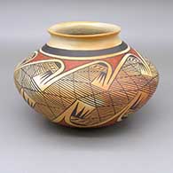 Polychrome jar with a flared opening, fire clouds, and a migration pattern geometric design
 by Fannie Nampeyo of Hopi