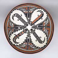 Large polychrome bowl with a lizard and geometric design on inside and a kiva step and geometric design on outside
 by Verda Toledo of Jemez