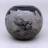Small black jar with a sgraffito antelope dancer and kiva step geometric design over a textured background
 by Dan Tafoya of Santa Clara