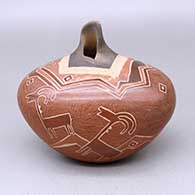 Sienna jar with an organic opening, an oval-shaped body, and a sgraffito ram, fine line, and geometric design
 by Dusty Naranjo of Santa Clara