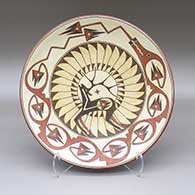 Polychrome plate with a painted avanyu, deer-with-heart-line, and feather ring geometric design
 by Lois Gutierrez of Santa Clara