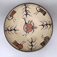 Large polychrome dough bowl with a traditional Kewa design featuring bird, cornstalk, and geometric elements
 by Arthur Coriz of Santo Domingo