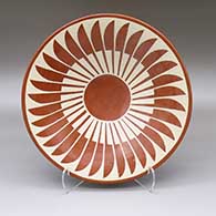 Large red-on-red plate with a painted feather ring and geometric design
 by Albert and Josephine Vigil of San lldefonso