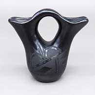 Small black-on-black wedding vase with a geometric design
 by Teresita Naranjo of Santa Clara