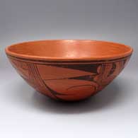 Black-on-red bowl polished inside and decorated outside with a 4-panel bird element and geometric design
 by Jofern Silas Puffer of Hopi