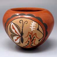 Small polychrome jar with a painted butterfly, corn plant and geometric design in a medallion
 by Phyllis M Tosa of Jemez