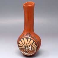 Polychrome vase with an organic opening and a painted medallion and geometric design
 by Phyllis M Tosa of Jemez