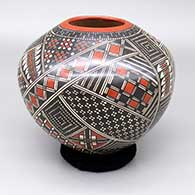 Polychrome jar with a cuadrillos and geometric design
 by Tony Silveira of Mata Ortiz and Casas Grandes