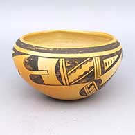 Black and red bowl with geometric design and fire clouds
 by Fannie Nampeyo of Hopi
