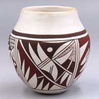 Polychrome jar with a 4-panel geometric design
 by Joy Navasie aka 2nd Frogwoman of Hopi