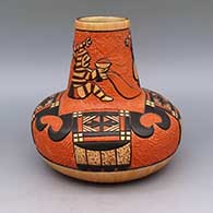 Polychrome jar with lightly carved and painted koshare and geometric design
 by Delmar Polacca of Hopi