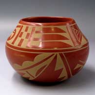 Buff-on-red jar with a 4-panel geometric design
 by Martha Appleleaf of San Ildefonso