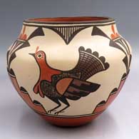 Polychrome jar with a 3-panel turkey, roadrunner, parrot and geometric design
 by Sofia Medina of Zia