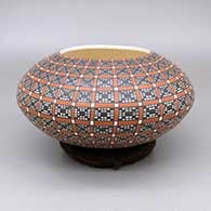 Polychrome jar with a fine line and geometric design
 by Rosa Loya of Mata Ortiz and Casas Grandes