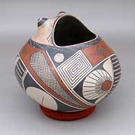 Polychrome frog effigy jar with a painted fish, cuadrillos, and geometric design
 by Roberto Banuelos of Mata Ortiz and Casas Grandes