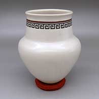 Polychrome jar with a slightly flared opening and a geometric design
 by Tavo Silveira of Mata Ortiz and Casas Grandes