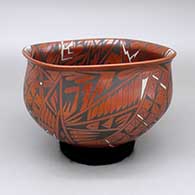 Polychrome bowl with a slightly flared, square opening, and a painted geometric design
 by Baudel Lopez of Mata Ortiz and Casas Grandes
