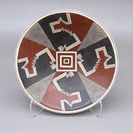 Polychrome plate with a fine line and geometric design
 by Cruz Renteria of Mata Ortiz and Casas Grandes