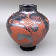 Red-on-gunmetal jar with a slightly flared opening and a geometric design
 by Gerardo Pedregon of Mata Ortiz and Casas Grandes