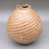 Red and white marbleized clay jar with an organic opening and a swirl melon design
 by Samuel Quezada of Mata Ortiz and Casas Grandes